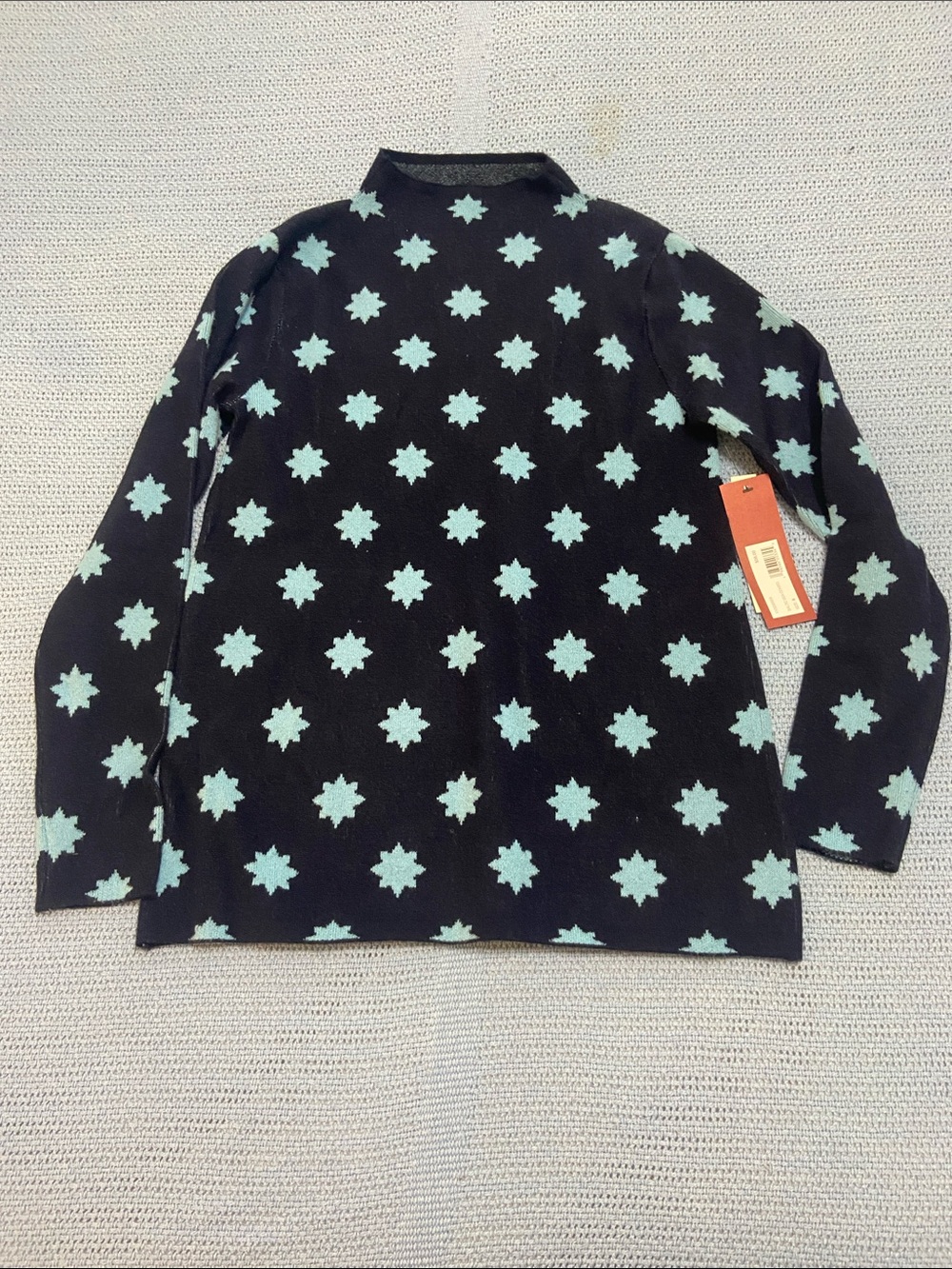 Navy Turtleneck Sweater with Pale Blue Snowflake Motif